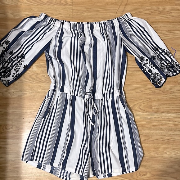 Blue striped off the shoulder romper with lace details on the sleeves. - Picture 1 of 1